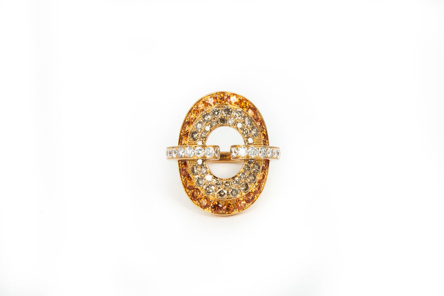 Arpege Orange Sapphire and Diamond Buckle Ring