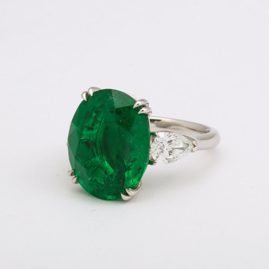 Oval Emerald and Pear-shape Diamond 3-stone Platinum Cocktail Ring